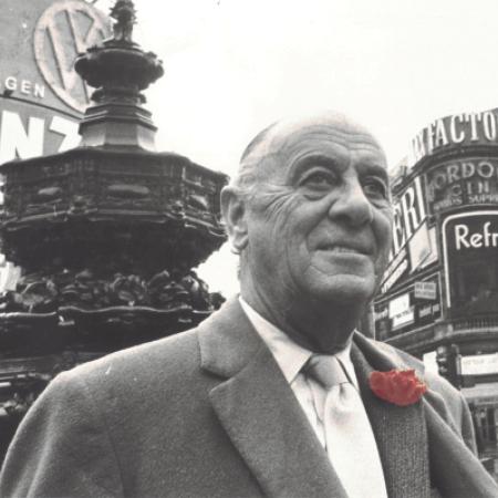 Joseph Levy in Piccadilly Circus with a red flower in his button hole