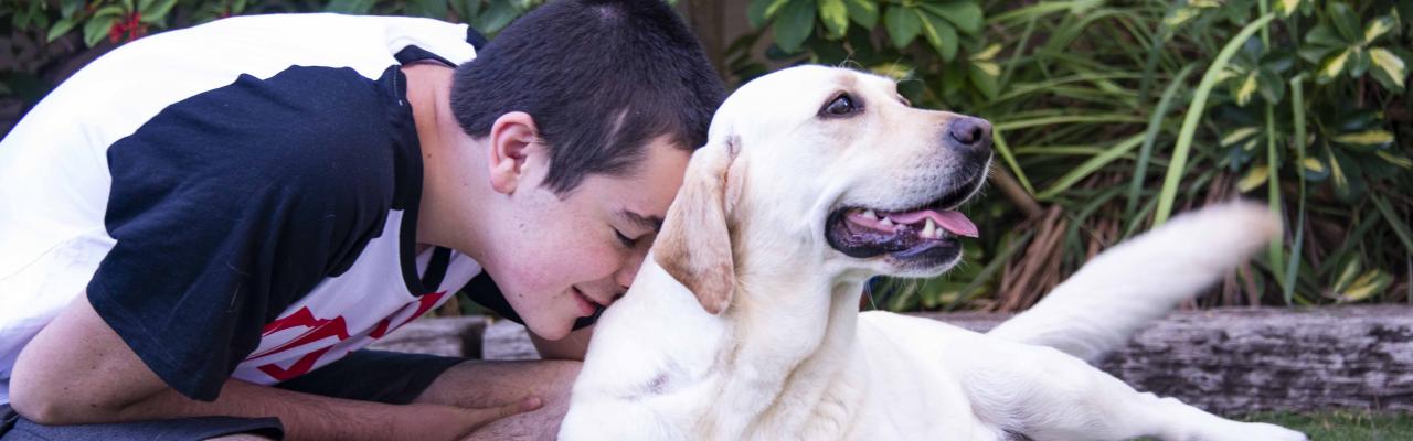 Boy with autism and his support dog